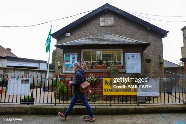 Pedestrian passes a Polling station in the Drumcondra area of Dublin, Ireland on March 5 ahead of the Irish Referendum on Friday. Ireland prepares to...