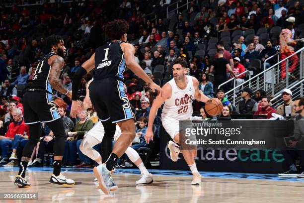 Georges Niang of the Cleveland Cavaliers drives to the basket during the game against the Atlanta Hawks on March 6, 2024 at State Farm Arena in...