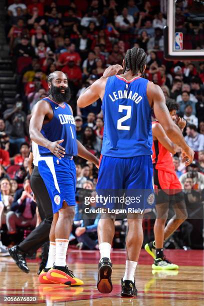 James Harden and Kawhi Leonard of the LA Clippers celebrate during the game against the Houston Rockets on March 6, 2024 at the Toyota Center in...