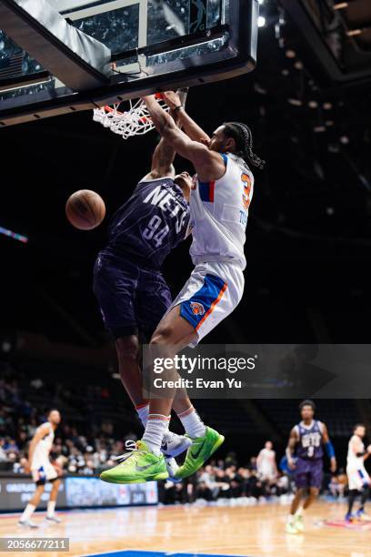 Jacob Toppin of the Westchester Knicks dunks the ball during the game against the Long Island Nets on March 6, 2024 at Nassau Coliseum in Uniondale,...