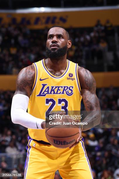 LeBron James of the Los Angeles Lakers shoots a free throw during the game against the Sacramento Kings on March 6, 2024 NBAE at Crypto.Com Arena in...