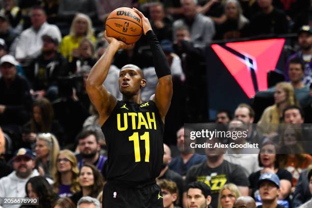 Kris Dunn of the Utah Jazz shoots during the second half of a game against the Chicago Bulls at Delta Center on March 06, 2024 in Salt Lake City,...