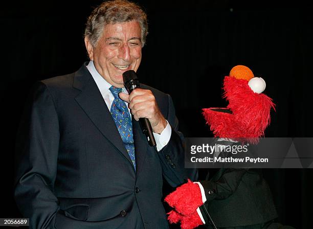 Singer Tony Bennett and muppet Elmo perform at the Sesame Street Workshop 35th Anniversary Gala at Cipriani June 4, 2003 in New York City.