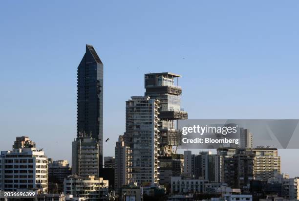 Antilia, a residence of Mukesh Ambani, chairman and managing director of the Reliance Industries Ltd., center right, in Mumbai, India, on Monday,...
