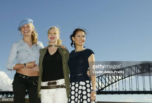 Actors Cameron Diaz, Drew Barrymore and Lucy Liu pose in front of the Sydney Harbour bridge during the Charlies Angels Full Throttle photocall at the...
