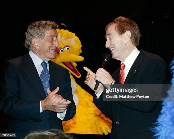 Bob McGrath, from the original cast of Sesame Street and singer Tony Bennett perform as Big Bird looks on at the Sesame Street Workshop 35th...