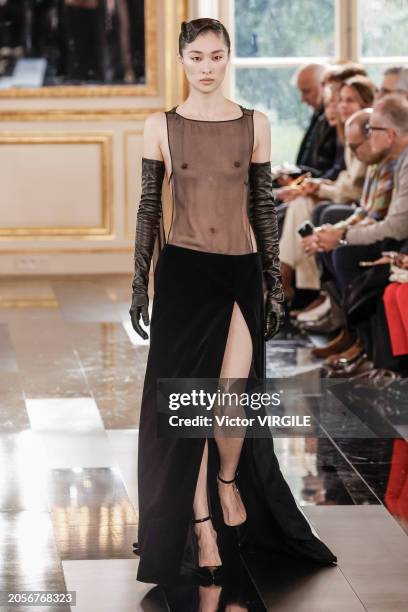 Model walks the runway during the Valentino Ready to Wear Fall/Winter 2024-2025 fashion show as part of the Paris Fashion Week on March 3, 2024 in...