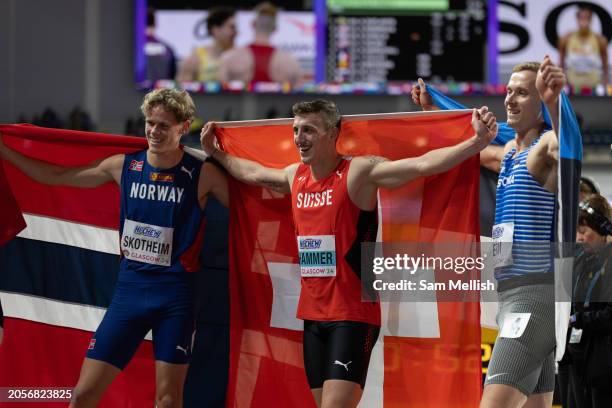 Sander Skotheim of Norway, Simon Ehammer of Switzerland and Johannes Erm of Estonia pose for photos after the Mens 1000m Heptathlon during day three...