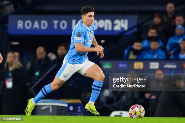 Julian Alvarez of Manchester City is in action during the UEFA Champions League Round of 16 match between Manchester City and FC Copenhagen at the...
