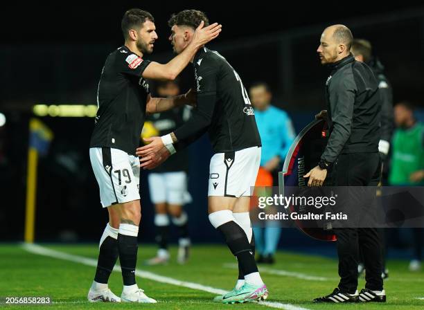 Nelson Oliveira of Vitoria SC goes out for Adrian Butzke of Vitoria SC during the Liga Portugal Betclic match between GD Estoril Praia and Vitoria...