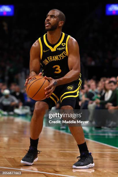 Chris Paul of the Golden State Warriors takes a shot against the Boston Celtics during the second half at TD Garden on March 03, 2024 in Boston,...