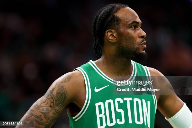 Oshae Brissett of the Boston Celtics looks on during the second half against the Golden State Warriors at TD Garden on March 03, 2024 in Boston,...