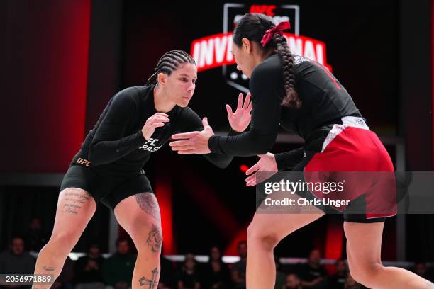 Karol Rosa grapples Raquel Canuto during the UFC Fight Pass Invitational 6 at UFC APEX on March 03, 2024 in Las Vegas, Nevada.