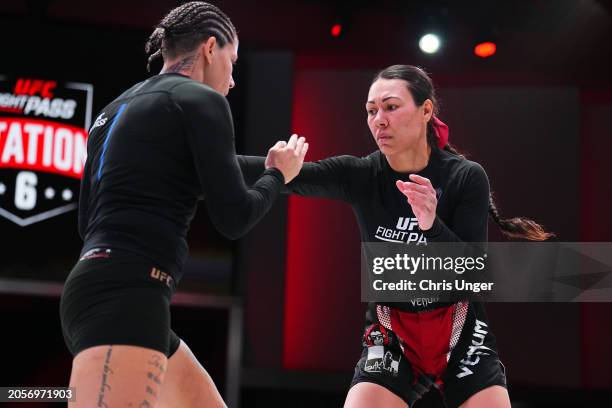 Raquel Canuto grapples Karol Rosa during the UFC Fight Pass Invitational 6 at UFC APEX on March 03, 2024 in Las Vegas, Nevada.