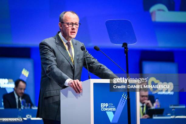 The leader of Germany's conservative Christian Democratic Union party Friedrich Merz addresses the audience during a plenary session at the European...