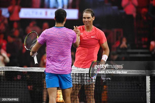 Rafael Nadal congratulates Carlos Alcaraz after winning The Netflix Slam, a live Netflix Sports event at the MGM Resorts | Michelob Ultra Arena on...