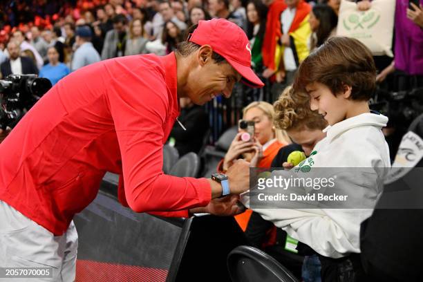 Rafael Nadal signs an autograph during The Netflix Slam, a live Netflix Sports event at the MGM Resorts | Michelob Ultra Arena on March 03, 2024 in...