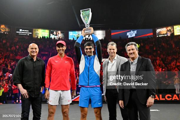 Andre Agassi, Rafael Nadal, Carlos Alcaraz, Greg Peters and William Hornbuckle attend The Netflix Slam, a live Netflix Sports event at the MGM...