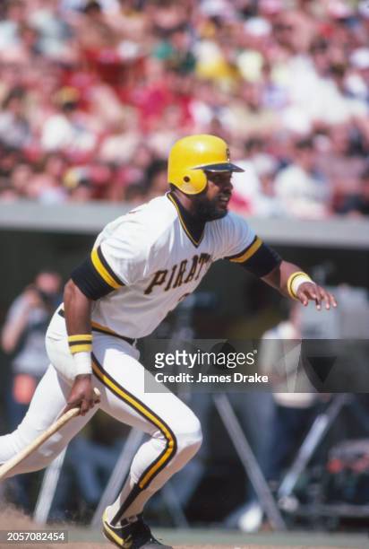 Pittsburgh Pirates right-fielder and All-Star Dave Parker starts for first during a game against the St. Louis Cardinals in April of 1980 at Three...