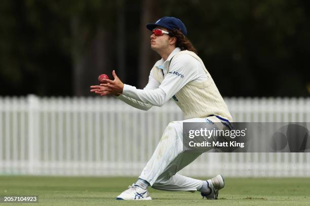Sam Konstas of New South Wales takes a catch to dismiss Thomas Kelly of South Australia during the Sheffield Shield match between New South Wales and...