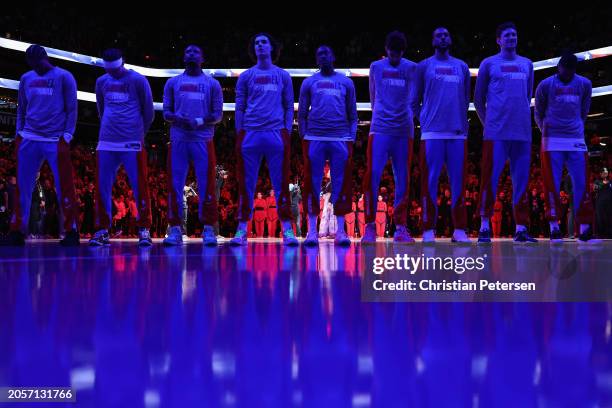 The Oklahoma City Thunder stand attended for the national anthem before the NBA game against the Phoenix Suns at Footprint Center on March 03, 2024...