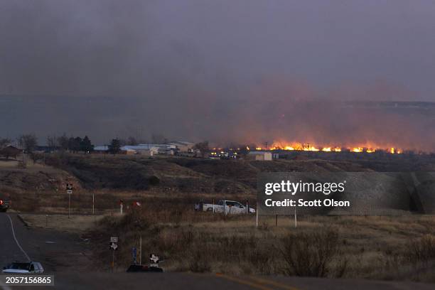 Firefighters battle flames from the Smokehouse Creek fire on March 03, 2024 near Sanford, Texas. The fire has burned more than a million acres in the...