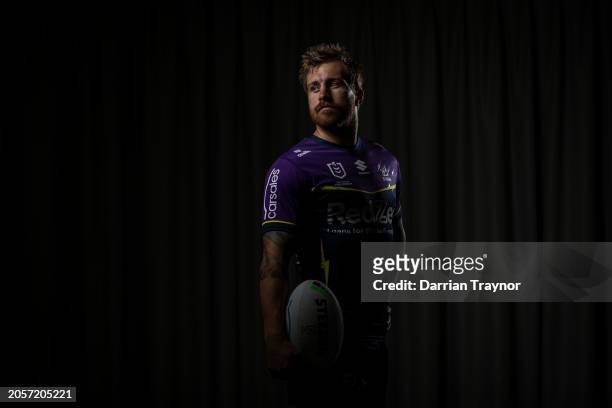 Cameron Munster poses for a photo during a Melbourne Storm NRL media opportunity at AAMI Park on March 04, 2024 in Melbourne, Australia.
