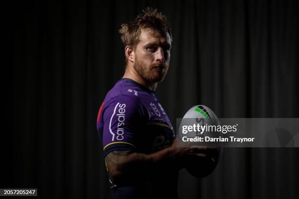 Cameron Munster poses for a photo during a Melbourne Storm NRL media opportunity at AAMI Park on March 04, 2024 in Melbourne, Australia.