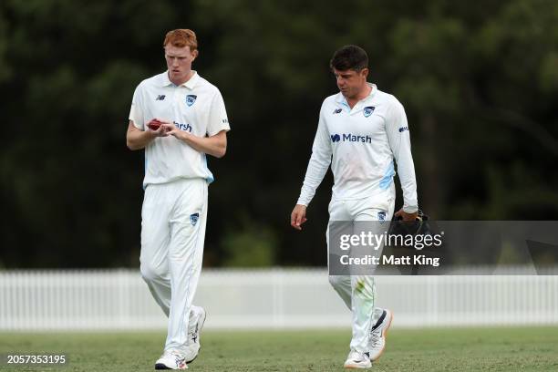 Jack Nisbet of New South Wales talks to captain Moises Henriques during the Sheffield Shield match between New South Wales and South Australia at...