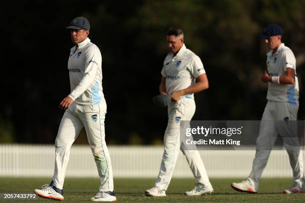 Moises Henriques, captain of New South Wales walks off with team mates after the match was called a draw during the Sheffield Shield match between...