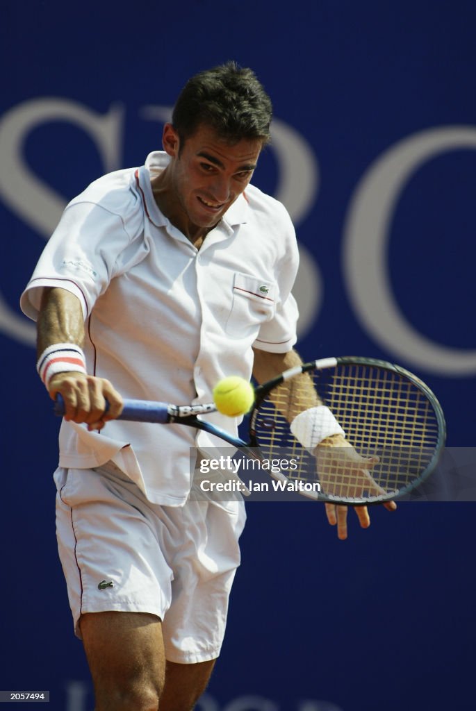 Alberto Martin of Spain plays a backhand