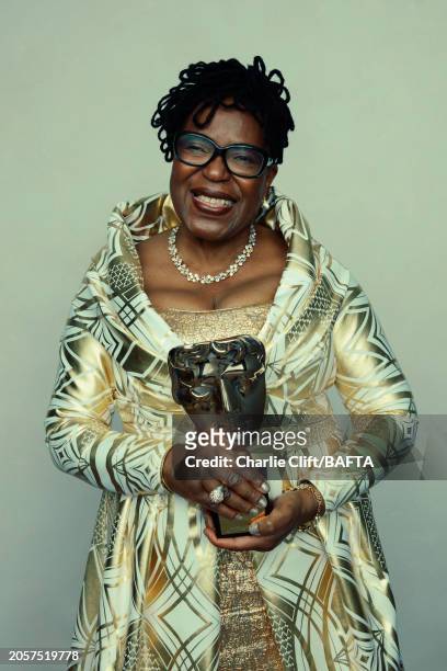 Curtaor June Givanni, recipient of the Outstanding British Contribution to Cinema award photographed backstage at the 2024 EE BAFTA Film Awards, held...