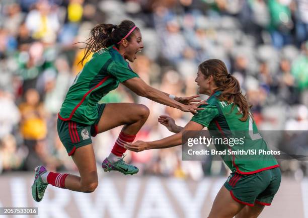 Karen Luna of Mexico celebrates her goal with Nicolette Hernandez during a 2024 Concacaf W Gold Cup quarterfinal match between Mexico and Paraguay at...