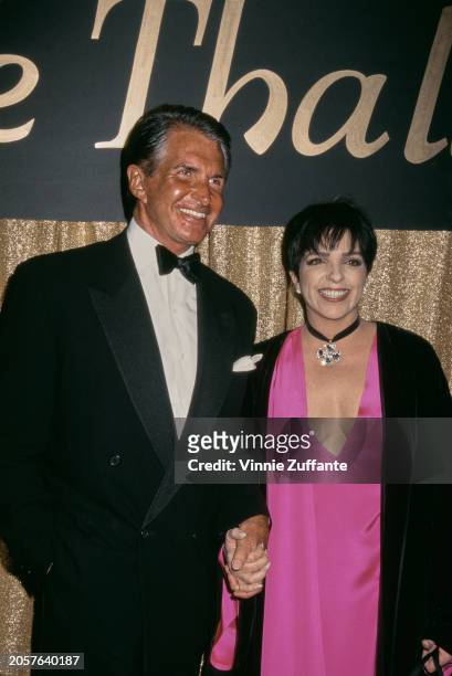American actors George Hamilton and Liza Minnelli attend The Thalians awards where Minelli has been awarded the lifetime achievement award, 8th...
