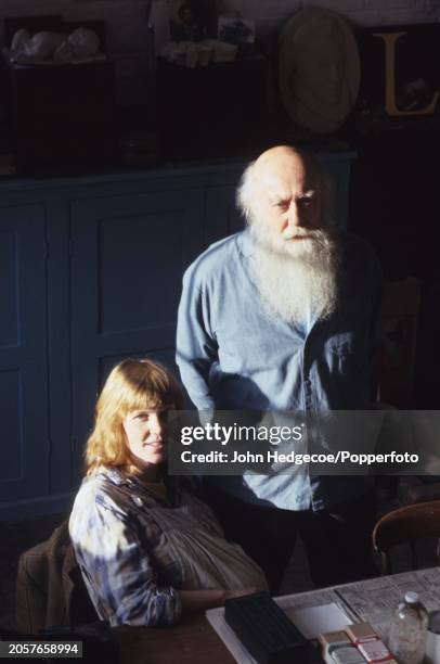 English typeface designer and stone letter-carver David Kindersley stands with his wife, Dutch born letter-cutter and designer Lida Lopes Cardozo...