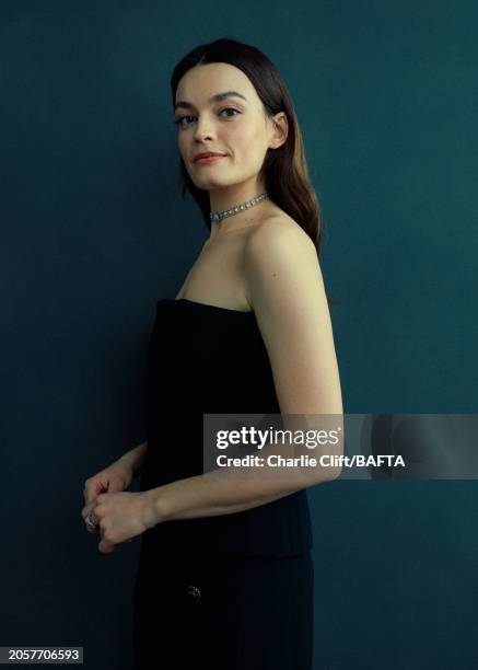 Actor Emma Mackey, photographed backstage at the 2024 EE BAFTA Film Awards, held at The Royal Festival Hall on February 18, 2024 in London, England.