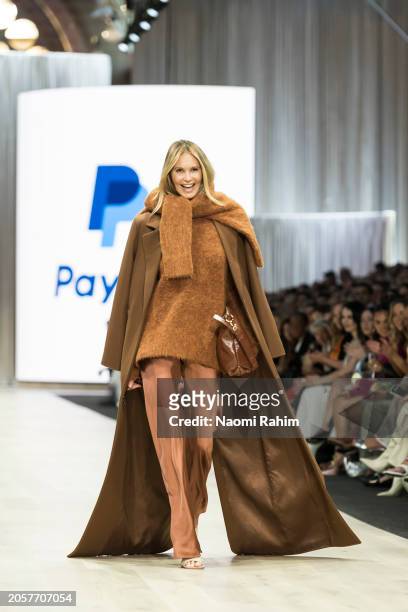 Elle Macphearson showcases designs by Viktoria & Woods during the Triumphant x PayPal Runway at Melbourne Fashion Festival 2024 on March 04, 2024 in...