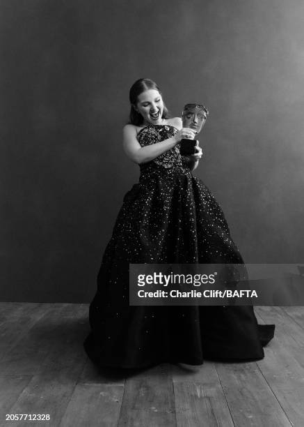 Actor Mia Mckenna-Bruce, winner of the EE Rising Star award, photographed backstage at the 2024 EE BAFTA Film Awards, held at The Royal Festival Hall...