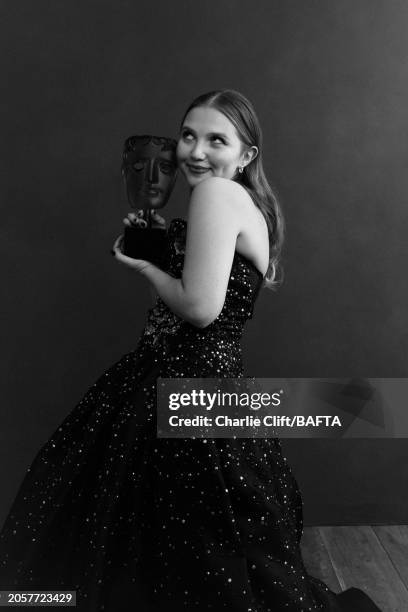 Actor Mia Mckenna-Bruce, winner of the EE Rising Star award, photographed backstage at the 2024 EE BAFTA Film Awards, held at The Royal Festival Hall...