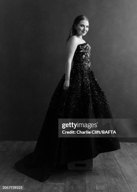 Actor Mia Mckenna-Bruce photographed backstage at the 2024 EE BAFTA Film Awards, held at The Royal Festival Hall on February 18, 2024 in London,...