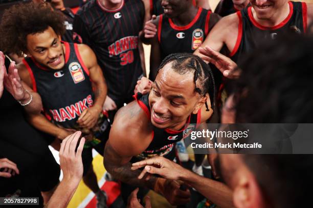 Justin Robinson of the Hawks celebrates victory with team mates during the NBL Play-In Qualifier match between Illawarra Hawks and New Zealand...