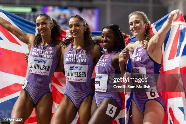 Bronze medalists, Laviai Nielsen, Lina Nielsen, Ama Pipi and Jessie Knight of Team Great Britain pose for photos following the Women's 4x400 Metres...