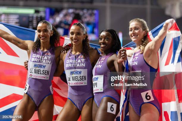 Bronze medalists, Laviai Nielsen, Lina Nielsen, Ama Pipi and Jessie Knight of Team Great Britain pose for photos following the Women's 4x400 Metres...