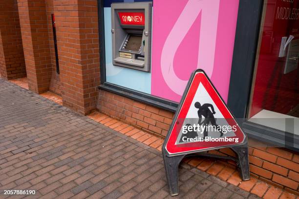 Roadworks sign near an automated teller machine at a Virgin Money UK Plc bank branch in Middlesbrough, UK, on Thursday, March 7, 2024. Nationwide...