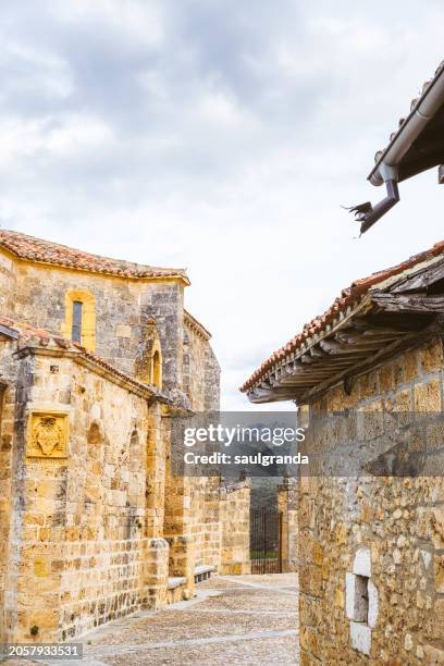 catholic church in a medieval village - castilla y león stock pictures, royalty-free photos & images