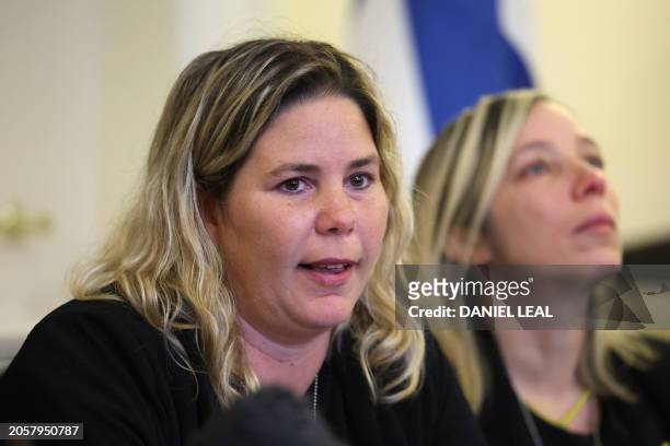 Inbal Zach , cousin of Tal Shoham, attends a press conference by relatives of people being held hostage by Palestinian Islamist group Hamas, at the...