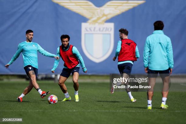 Mattia Zaccagni and Felipe Anderson in action during SS Lazio training session and press conference before the UEFA Champions League match against FC...