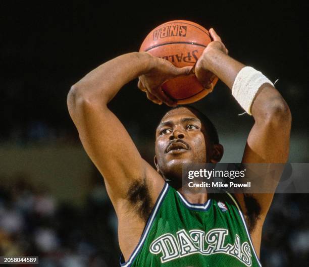 Mark Aguirre, Small Forward for the Dallas Mavericks prepares to shoot a free throw to the basket during the NBA Pacific Division basketball game...