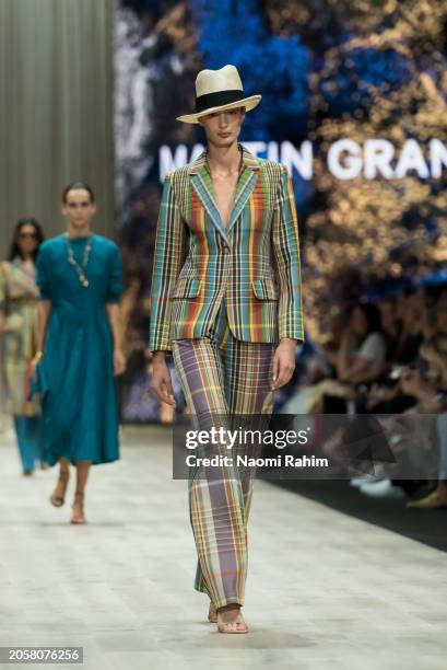 Model showcases designs by Martin Grant during the Triumphant x PayPal Runway at Melbourne Fashion Festival 2024 on March 04, 2024 in Melbourne,...