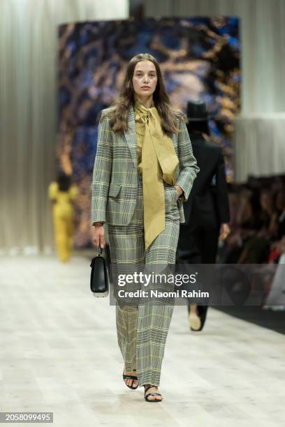 Model showcases designs by Martin Grant during the Triumphant x PayPal Runway at Melbourne Fashion Festival 2024 on March 04, 2024 in Melbourne,...